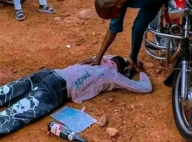 Photo: Graduate Prostrates In Public To Appreciate Father Who Sponsored His University Education Through ‘Okada Riding’